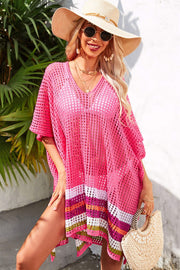 Rose pink crochet cover-up with rainbow hemline, V-neck, and short sleeves.