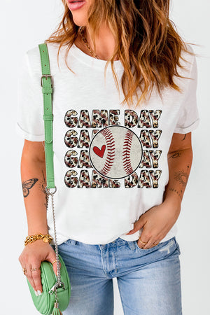White baseball graphic tee with "Game Day" text and a baseball with a heart.