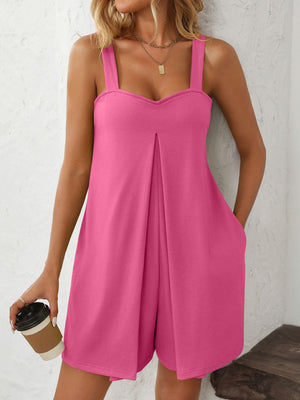 Hot pink pleated bodice pocketed romper with wide straps and v-neckline.