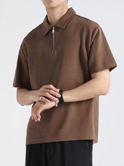 Brown cotton zippered casual polo shirt for men with short sleeves and a spread collar.