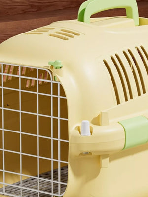 Cheerful ventilated pet carrier bag in pastel yellow with green accents and a white wire door.