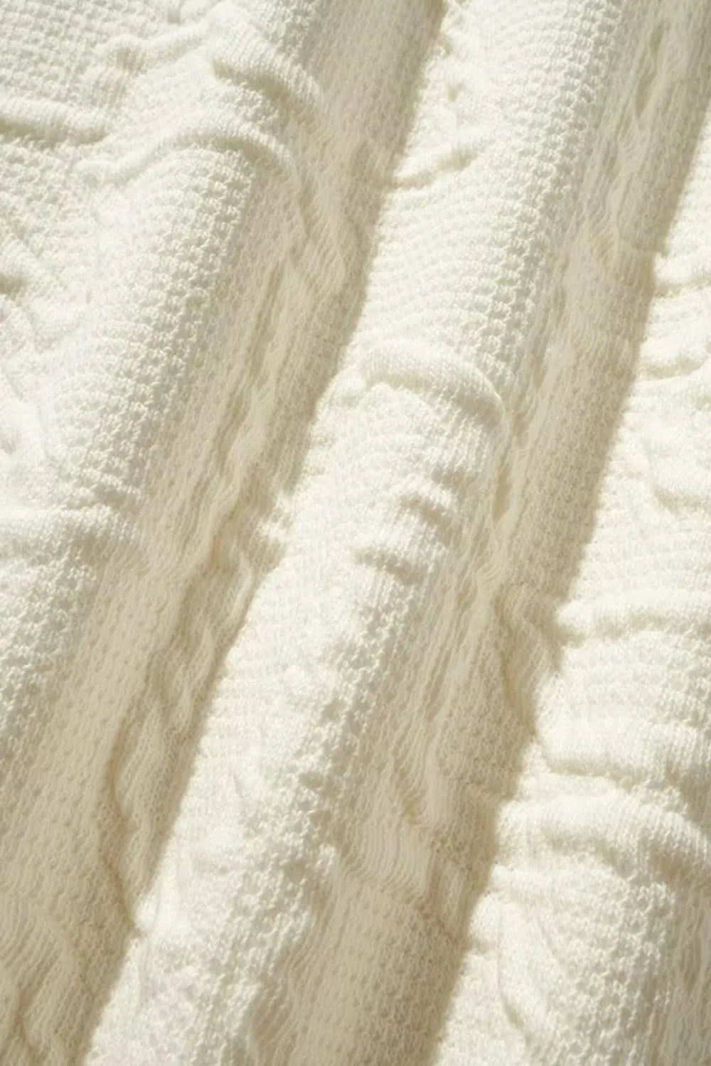 Ivory crewneck sweatshirt with embossed geometric texture