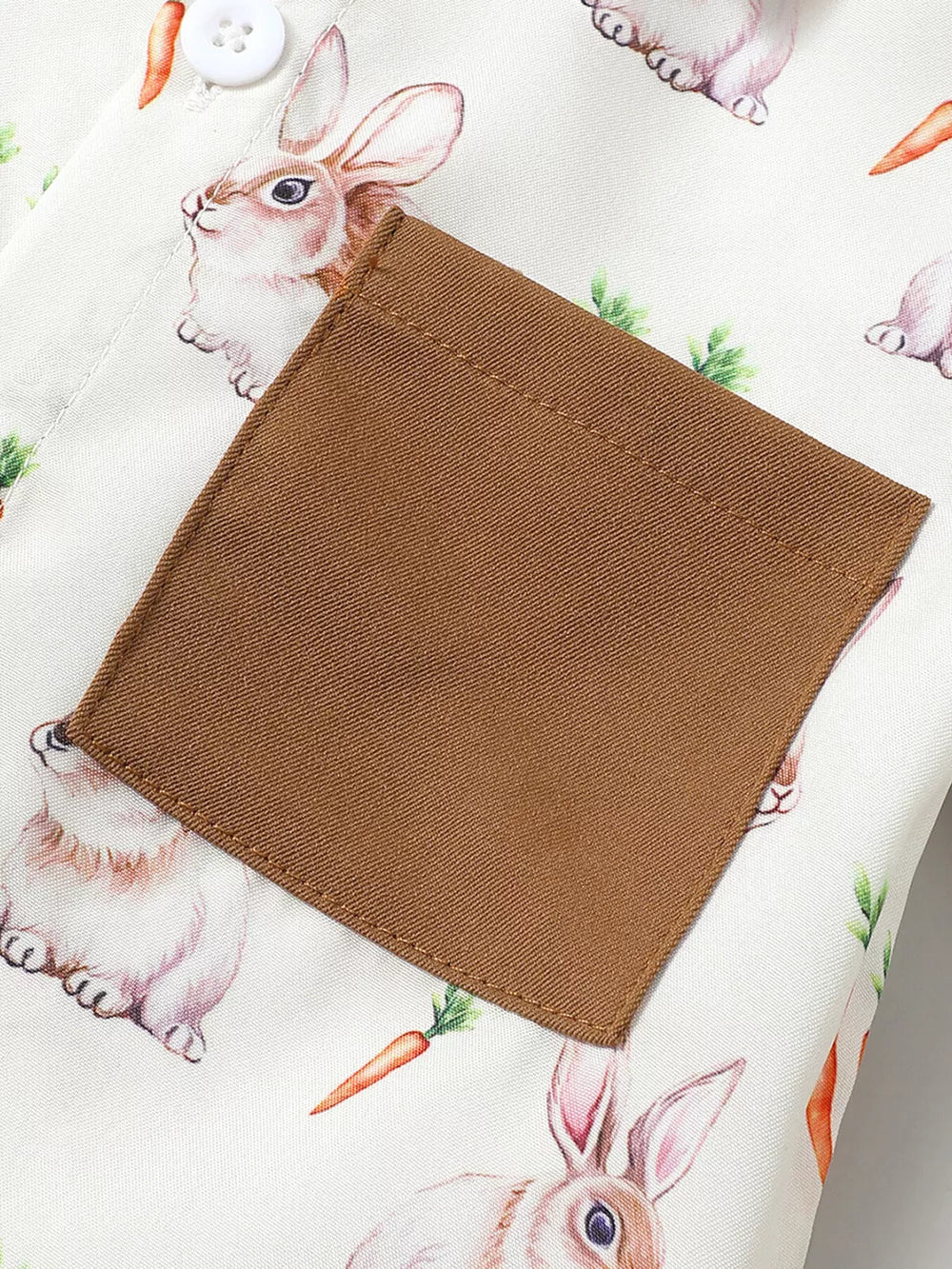 Baby set with bunny and carrot print, white button-up shirt with brown pocket detail.