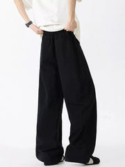 Men's black oversized wide-leg jeans made of 100% cotton with a relaxed fit.