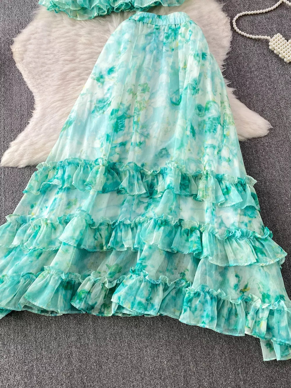 Light green floral ruffle bikini bottom with tiered ruffles and tie-dye pattern.