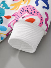 Kids multicolor animal print crew neck sweatshirt with white ribbed cuffs.