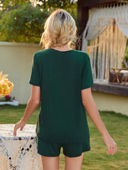 Dark green lounge set with puff sleeve top and shorts.