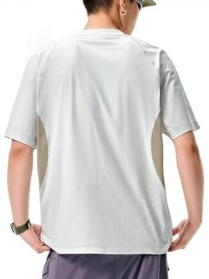 Men's oversized t-shirt with geometric panels in a light neutral color, crew neck, short sleeves.