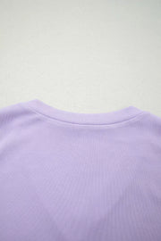 Lilac ribbed bodice detail of a floral maxi dress