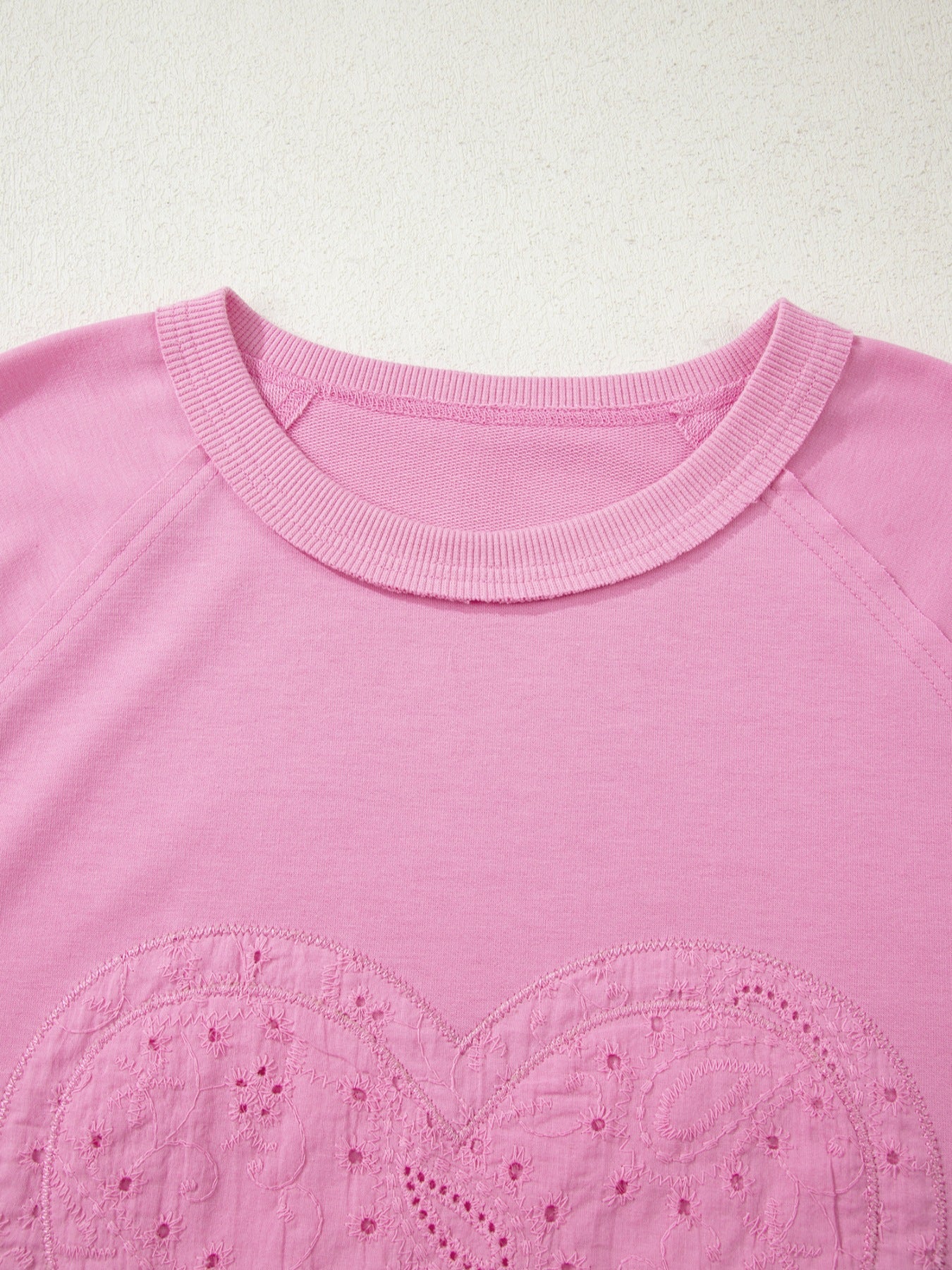 Pink cotton crew-neck sweatshirt with embroidered heart detail