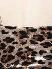 Chic leopard print bodycon midi dress with a back zipper detail.
