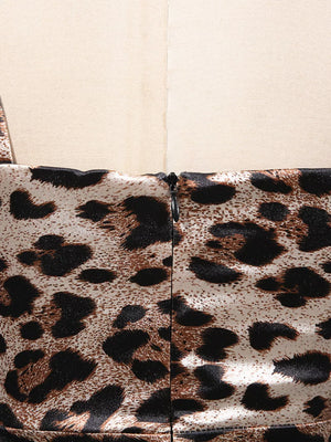 Chic leopard print bodycon midi dress with a back zipper detail.