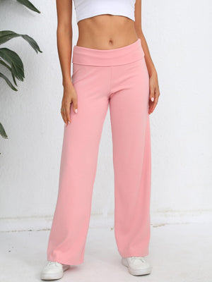 Blush pink palazzo trousers with a fold-over waistband, wide leg, and casual styling.