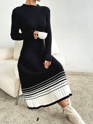 Black ribbed knit midi dress with long sleeves and contrast striped hem