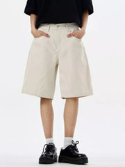 Off White chino shorts with drawstring waist and relaxed fit.