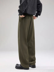 Men's army green wide-leg sweatpants with drawstring and pockets.