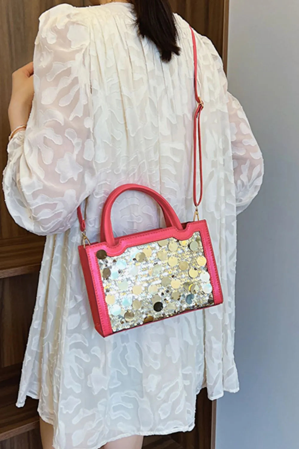 Hot Pink sequin embellished structured mini bag with gold circle sequins and a crossbody strap.