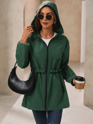 Dark green hooded windbreaker jacket with ruffled drawstring waist and zip front.