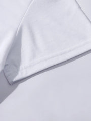 White t-shirt hem detail with visible stitching