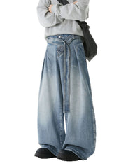 Belted relaxed fit men's jeans in light blue denim with a wide leg and tie waist.