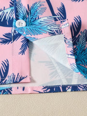 Pink baby shirt with tropical palm print, white button detail, cotton fabric