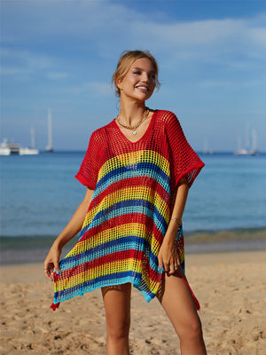 Rainbow stripe crochet beach poncho with V-neck and short sleeves.
