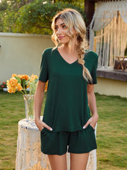 Dark green V-neck lounge set with shorts and short sleeves.