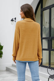 Textured turtleneck sweater in tan with long sleeves and a relaxed fit.