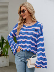 Blue and pink striped crochet crop sweater with scalloped hem and bell sleeves.