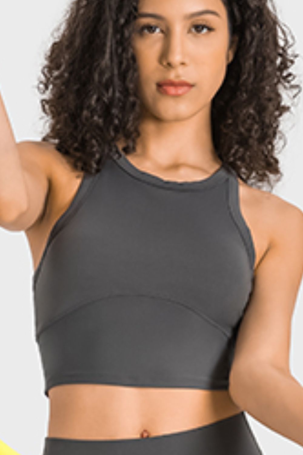 Gray sculpted neckline crop top with curved seam detail, perfect for activewear.