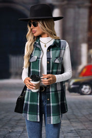 Plaid utility vest in dark green with button front and patch pockets, worn over a white turtleneck.