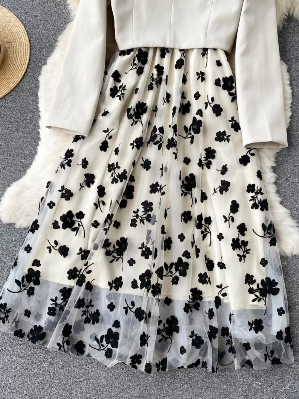 Maternity midi dress with black floral overlay and matching blazer.