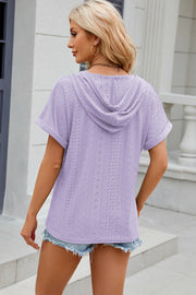 Lavender perforated hooded tee with short sleeves and a casual fit.