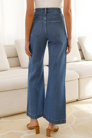Sailor-inspired wide-leg denim trousers in medium wash with a flared hem.