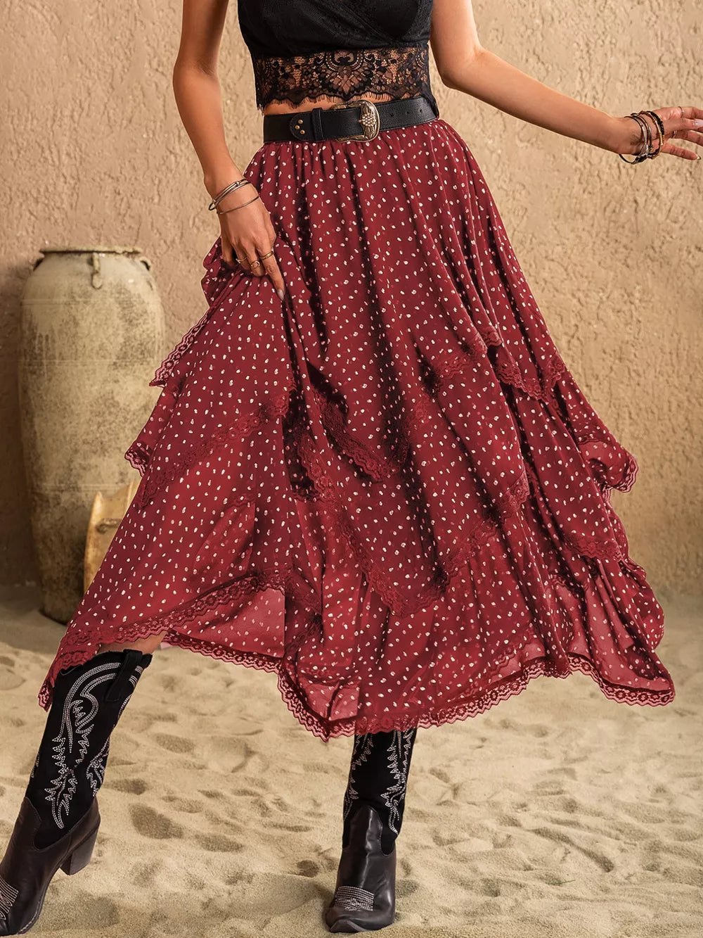 Burgundy tiered midi skirt with white polka dots and lace trim.