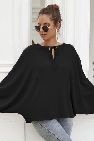 Black voluminous sleeve blouse with keyhole neckline and tie detail.