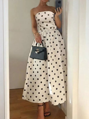 Charming polka dot strapless midi dress in cream polyester with an A-line cut.