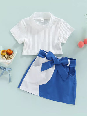 Baby knit top and blue skirt set with bow detail