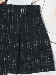 Black plaid mini skirt with a belted waist and ruched detail.