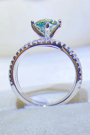 Sterling silver ring with light green stone and pavé details