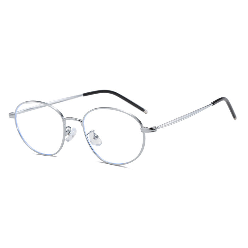 Vintage-inspired round frame eyeglasses with silver metal frames and black temple tips.