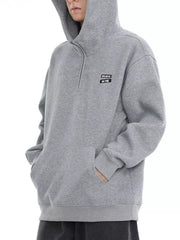 Plus-size grey quarter-zip hoodie with a small "BELIEVE IN ME" patch detail.