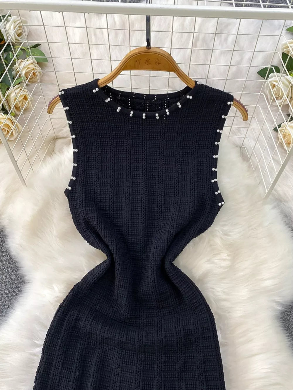 Black textured knit midi dress with pearl neckline and cutout details