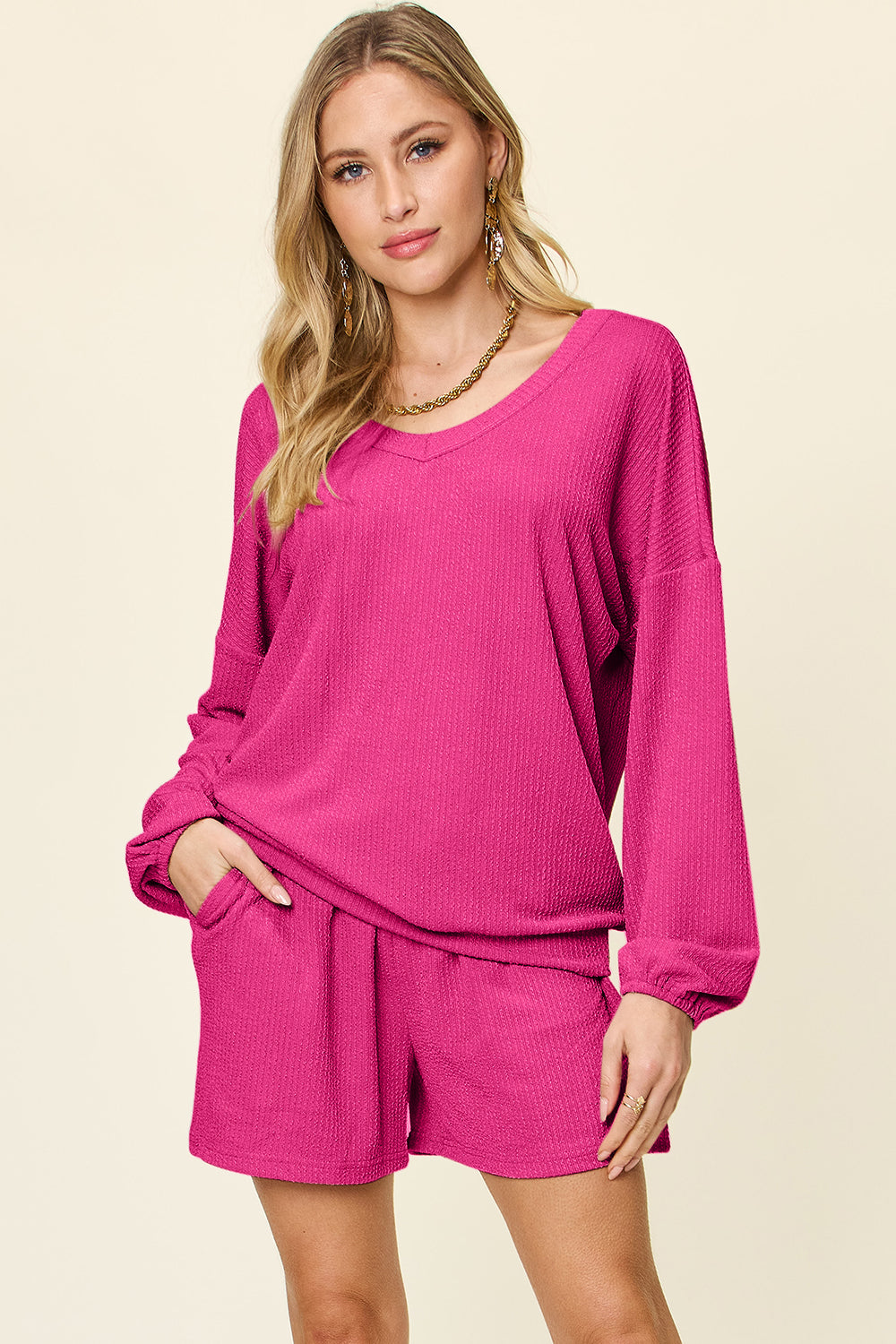 Hot Pink waffle knit lounge set with blouson sleeves and shorts.