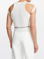 White tank top with sculpted shoulder straps and a cutout detail.