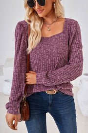Puffed sleeve ribbed square neck top in red-violet.