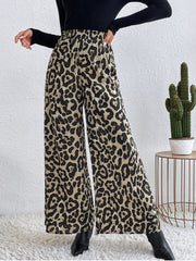 Leopard print palazzo trousers with a high elastic waist and wide leg.