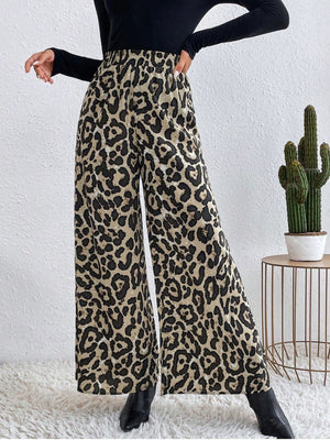 Leopard print palazzo trousers with a high elastic waist and wide leg.