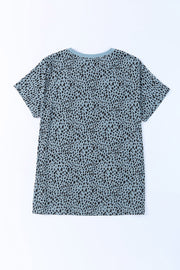 Teal spotted print crew neck t-shirt with short sleeves.