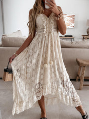 Beige lace V-neck maxi dress with ruffles and tassel detail.